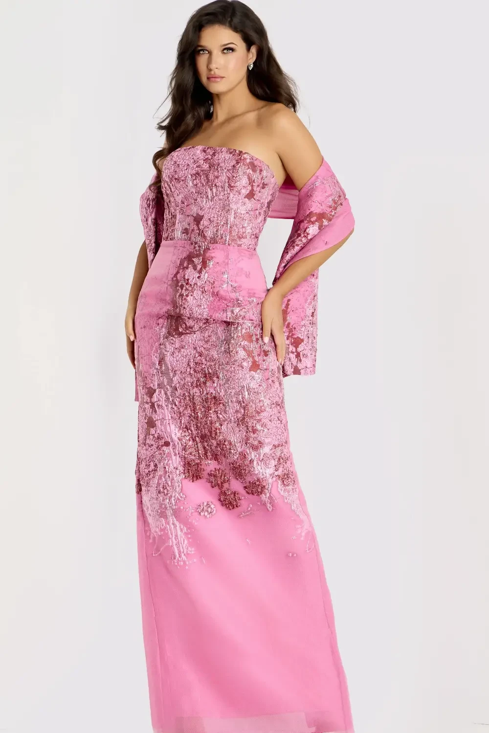 model is wearing a sparkly pink evening dress