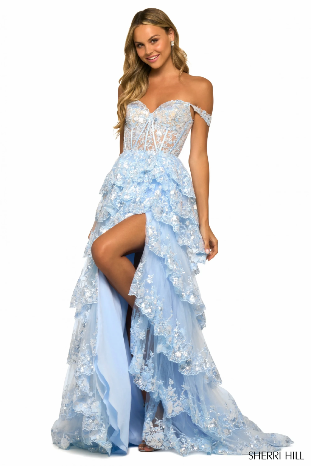 Model wearing a blue prom dress