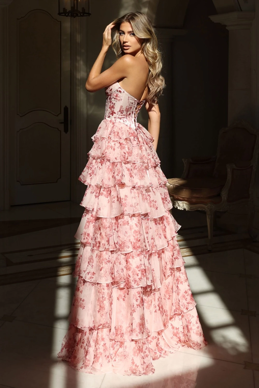 Model wearing a pink gown