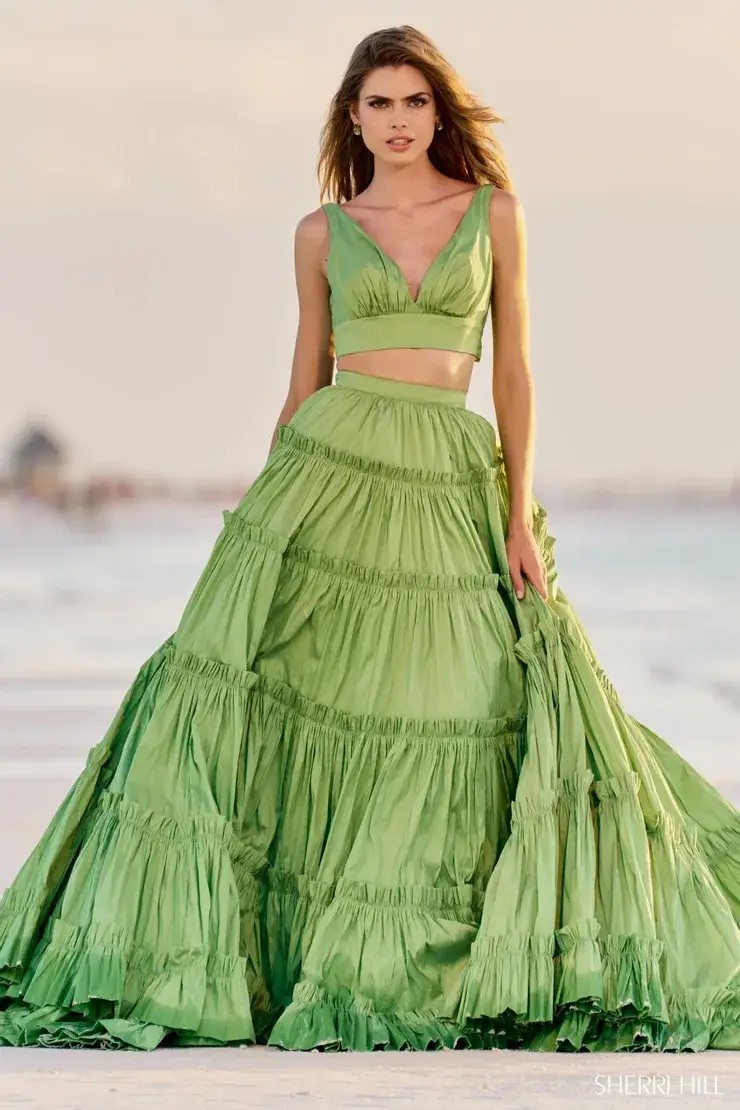 Model wearing a green gown