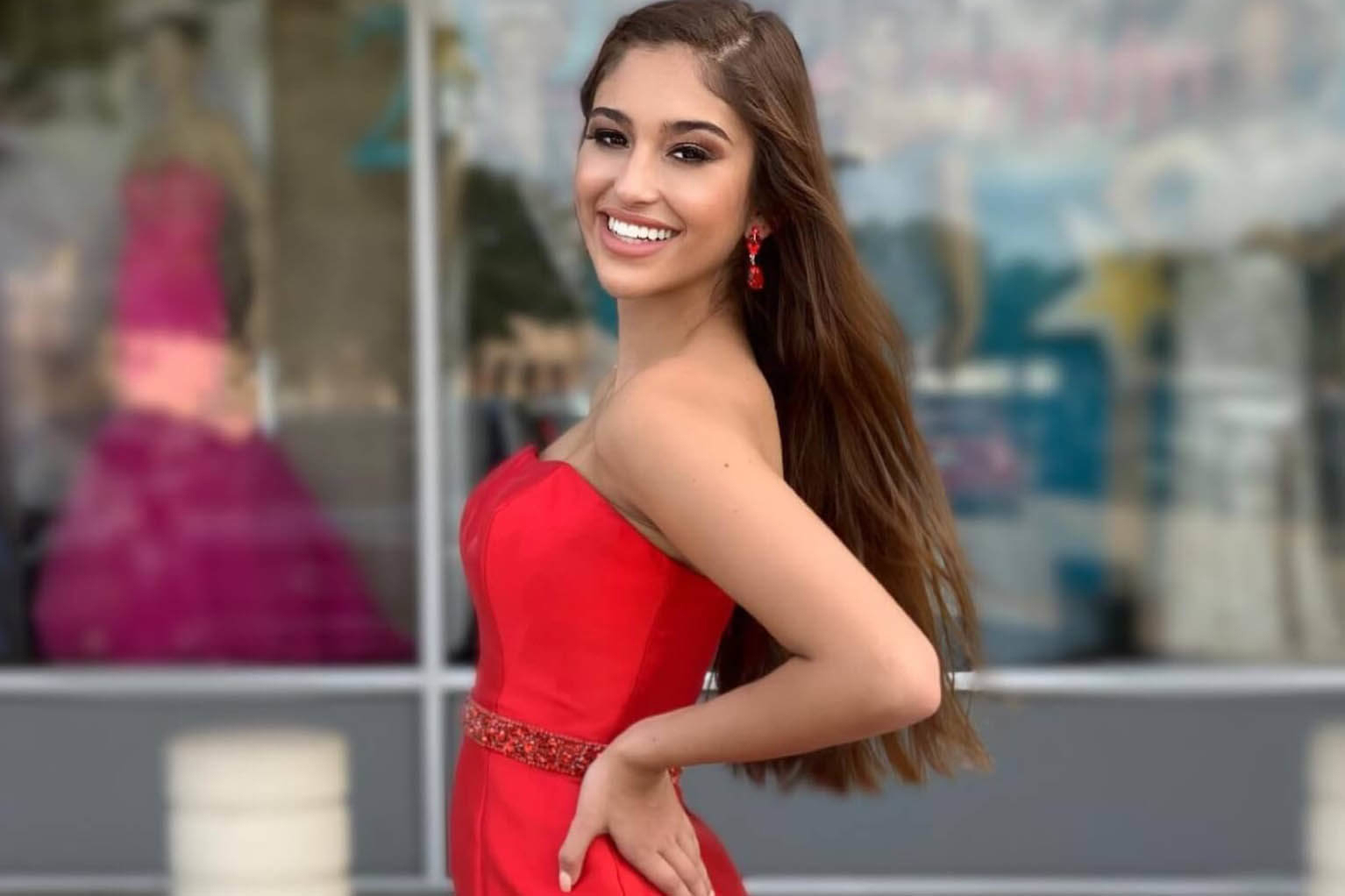 Model wearing a red dress
