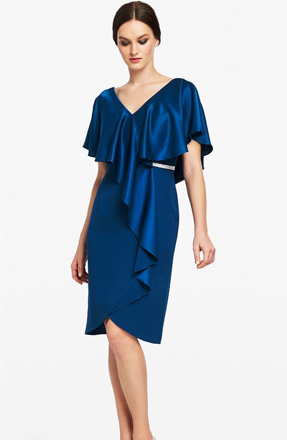 Model wearing a blue dress